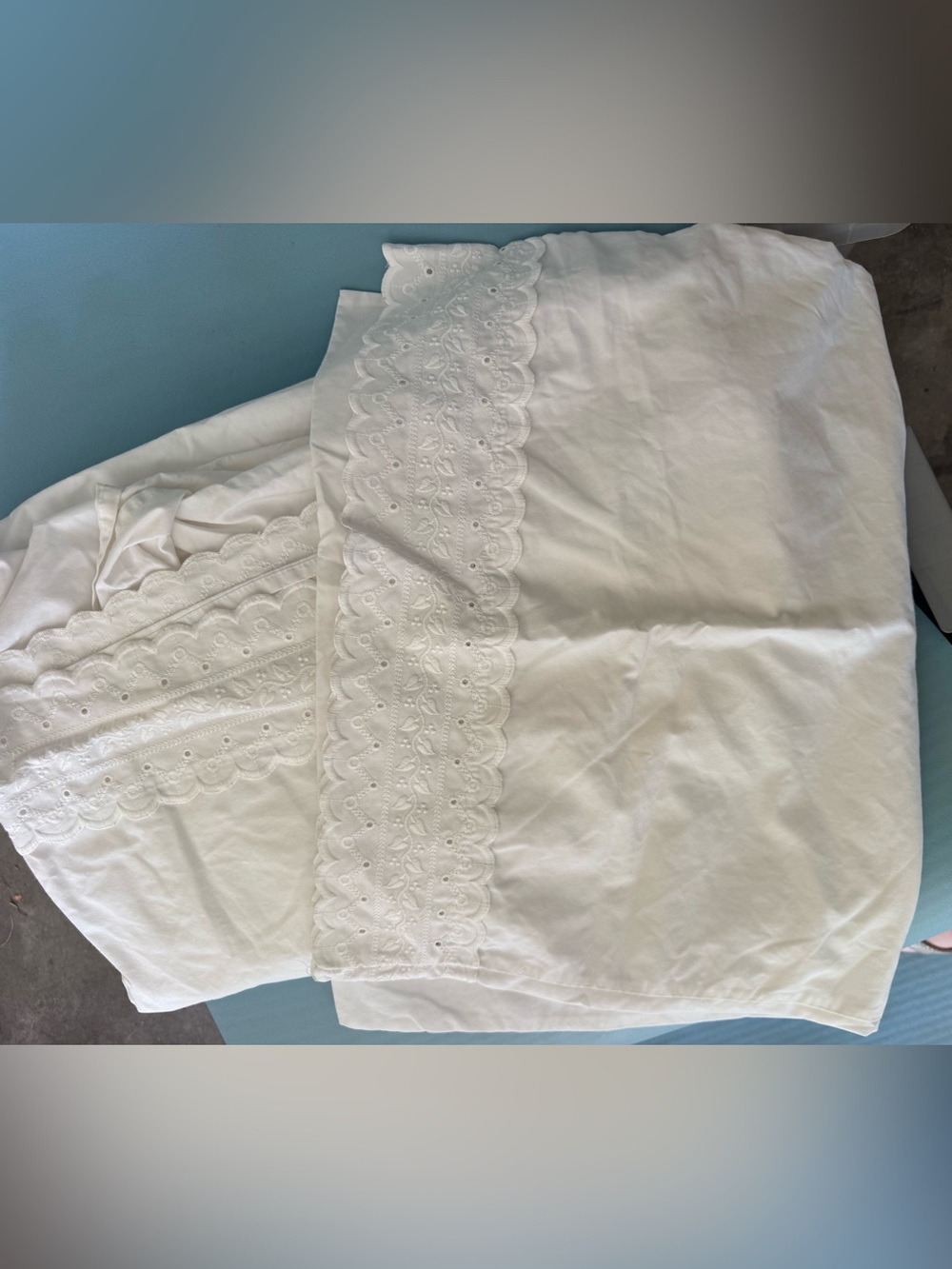 Matching white top sheet and pillow case